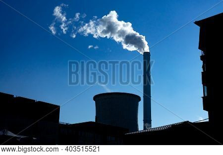 Bucharest, Romania - January 15, 2021: Chimney Of Cet Progresul Power Plant, Pollute With Smoke From