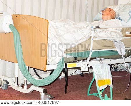 Elderly,frail Bed Ridden Man At His Home Living Room,hampshire,england U.k.