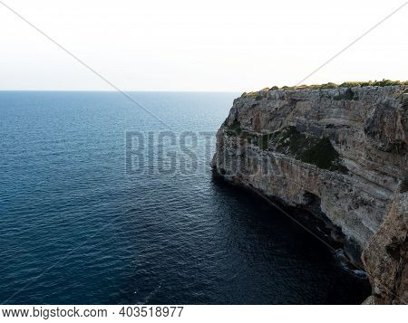 Panorama View Of Rocky Cliff Coast Shore Turquoise Mediterranean Sea Water Cala Llombards Mallorca B