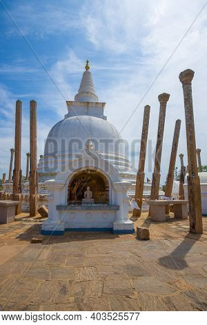 At The Ancient Stupa Of Thuparamaya On A Sunny Day. Anuradhapura, Sri Lanka