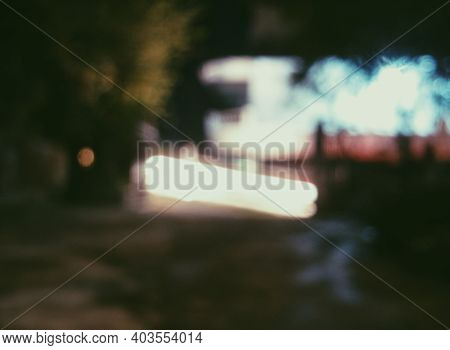 Defocused Shot Of The Late Night Neighborhood