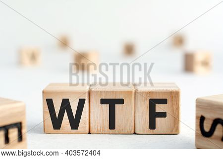 Wtf - Word From Wooden Blocks With Letters, Wtf Concept,  Top View On Grey Background