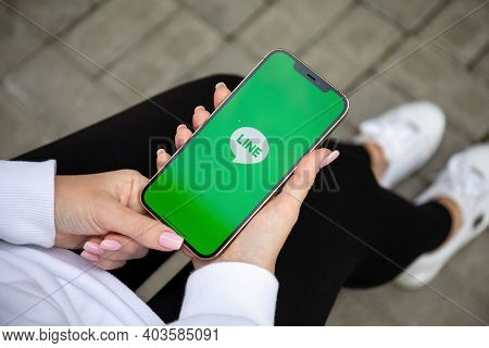 Alanya, Turkey - December 3, 2020: Woman Hand Holding Iphone 12 Pro Max Gold With Social Networking 