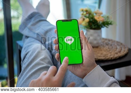 Alanya, Turkey - December 6, 2020: Man Hand Holding Iphone 12 Pro Max Gold With Social Networking Se