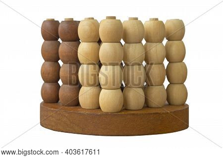 Board Game With Wooden Balls. An Exciting Puzzle Game With Barrels. Tic-tac-toe In Three Dimensions,