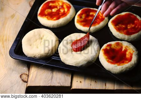 Mini Pizza Cooking. Home-made Fast Food. Soft Focus.
