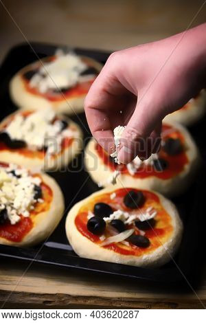 Mini Pizza Cooking. Home-made Fast Food. Soft Focus.