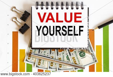 Inscription Value Yourself, On Notebook, Concept Of Planning, With Office Tools ,chart And Dollars