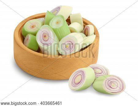 Fresh Lemongrass Slices In Wooden Bowl Isolated On White Background With Clipping Path And Full Dept