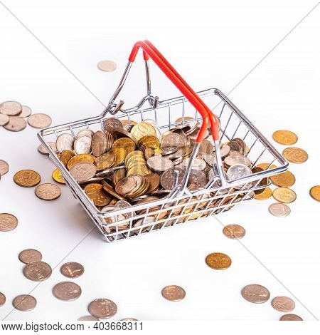 Metal Basket With Metal Money Coins On White Background - Multicurrency Basket Concept
