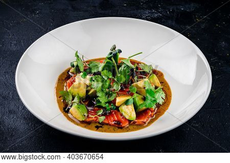 Top View Of Seared Salmon With Avocado In Bowl, Seared Salmon Salad With Sauce At A Premium Restaura