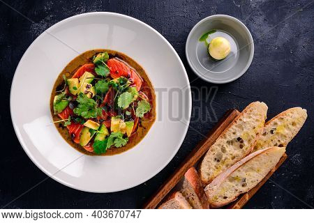 Top View Of Seared Salmon With Avocado In Bowl, Seared Salmon Salad With Sauce At A Premium Restaura