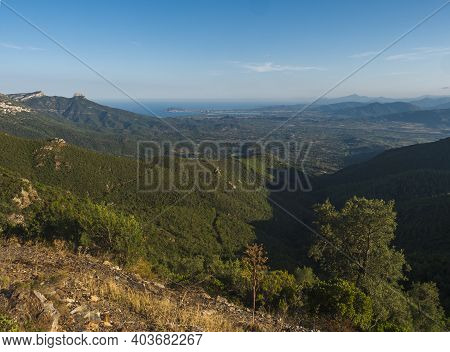 Aerial View Of Green Landscape Of Supramonte Mountains With Baunei And Arbatax Village, Limestone Ro