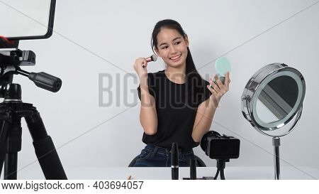 Beauty Blogger. Asian Teen Woman Sit In Front Of Camera And Live Broadcasting