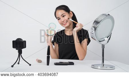 Beauty Blogger. Asian Teen Woman Sit In Front Of Camera And Live Broadcasting