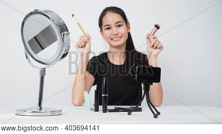 Beauty Blogger. Asian Teen Woman Sit In Front Of Camera And Live Broadcasting