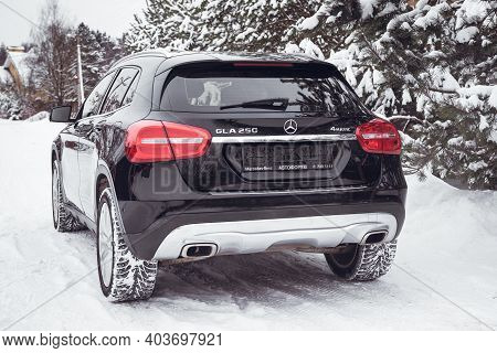 MOSCOW, RUSSIA-JANUARY 10, 2021: Mercedes Benz GLA 250 on a snow-covered street outside the city.