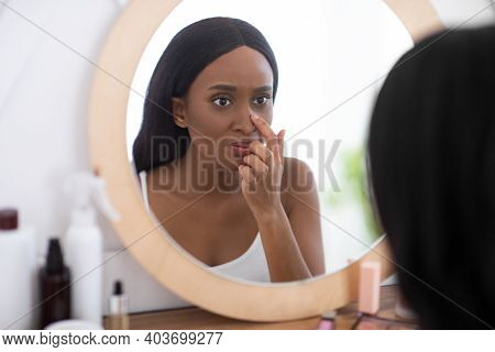 Problem Skin During Menstruation, Acne, Pimples And Hyperandrogenism. Sad Young African American Wom