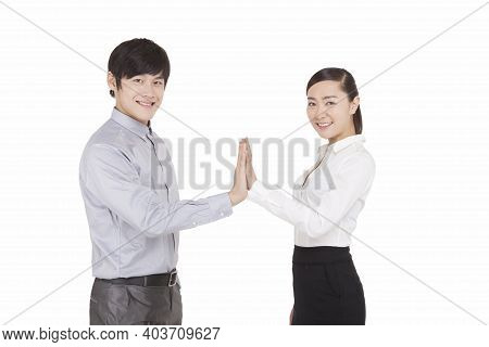 Portrait Of Business Man And Business Woman Claping High Quality Photo
