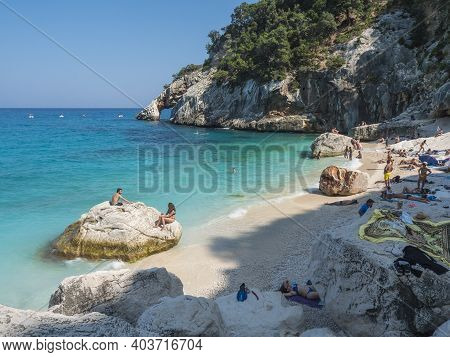 Gulf Of Orosei, Sardinia, Italy, September 8, 2020: A View Of Cala Goloritze Beach With Bathing Tour