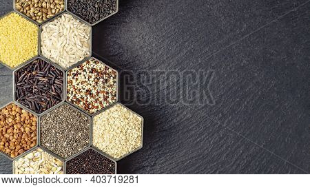 Various Cereals And Grains In The Hexagonal Shaped Honeycomb Jars