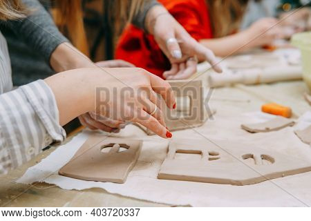 Women's Hands Knead Clay, Drawing Elements Of The Product. Production Of Ceramic Products At The Mas
