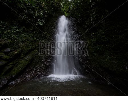 Panorama View Of Cascada De Reina Waterfall In Tropical Rain Cloud Forest Mindo Valley Jungle Nambil