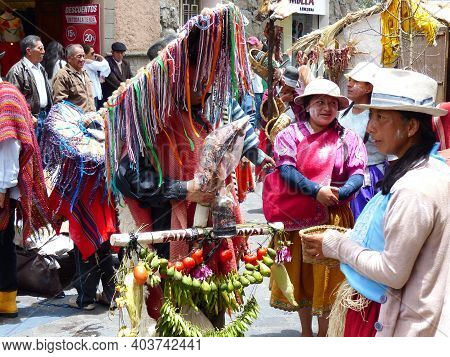 Cuenca,ecuador-february 22,2020:carnival Parade.crowd Of Village People In Huge Hats As Mythical Cha