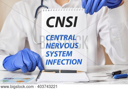 Cnsi Card In Hands Of Medical Doctor. Doctor's Hands In Blue Gloves Holding A Sheet Of Paper With Te
