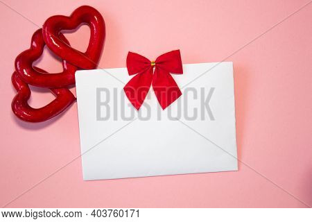 Valentines Day Congratulation. Red Rose And Greeting Card With Heart Sign On Black Background Top Vi