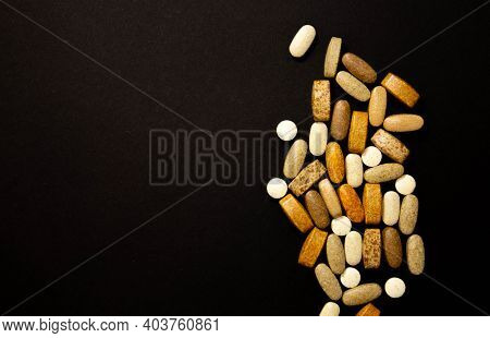 Glutamine And Bcaa Amino Acids. Nutrition For Bodybuilding. Fitness Supplements On Black Stone Backg
