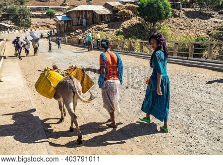 Aksum, Ethiopia - Feb 08, 2020: Ethiopian People On The Road From Axum To The Simien Mountains, Nort