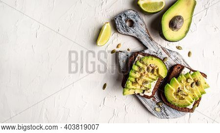 Bruschetta With Avocado, Cheese. The Concept Of Eco Products. Organic Farm Dairy Products, Cheeses, 