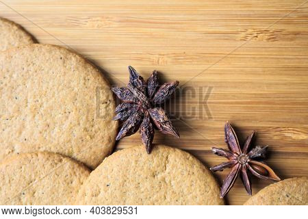 Round Gingerbread Cookies On Wooden Background With Blank Space