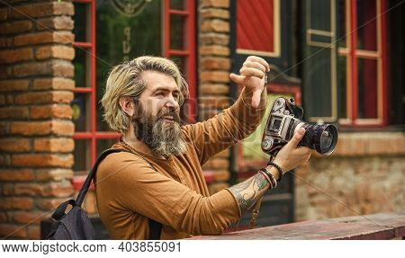 Professional Look. Capture These Memories. Slr Camera. Hipster Man With Beard Use Professional Camer
