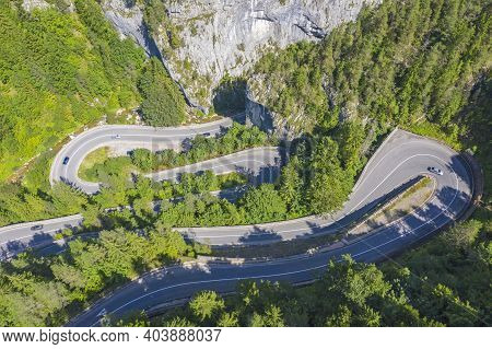 Curvy Mountain Road Viewed From Above In Romanian Carpathians. The Bicaz Gorge Is A Canyon In The No
