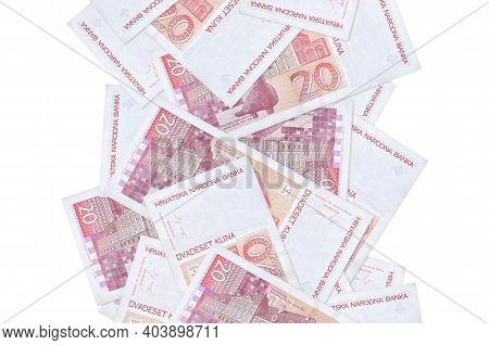 20 Croatian Kuna Bills Flying Down Isolated On White. Many Banknotes Falling With White Copy Space O