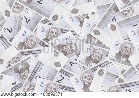 2 Estonian Kroon Bills Lies In Big Pile. Rich Life Conceptual Background. Big Amount Of Money
