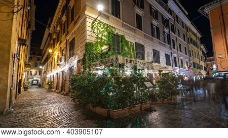 Via Delle Muratte / Rome / Italy - July 4, 2019: Restaurant In Rome, Outside Area With Night Streets