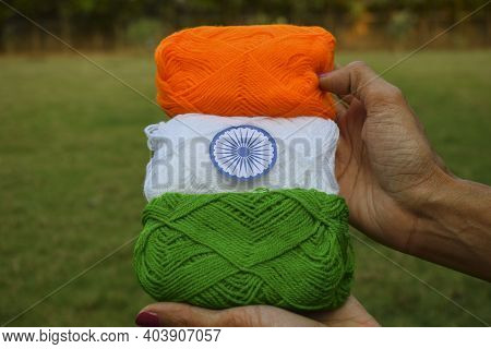 Indian Flag Tricolor Tiranga Saffron, White And Green Embroidery Threads. Female Palms Holding Embro