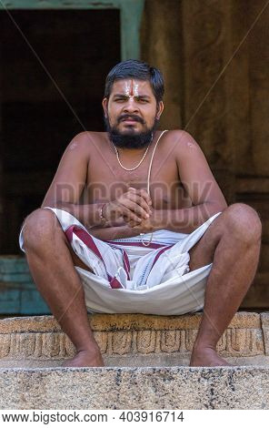 Hampi, Karnataka, India - November 5, 2013: Malyavanta Raghunatha Temple. Closeup Of Priest-guru Man