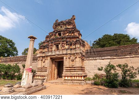 Hampi, Karnataka, India - November 5, 2013: Malyavanta Raghunatha Temple. Flag Post And  Black Molde