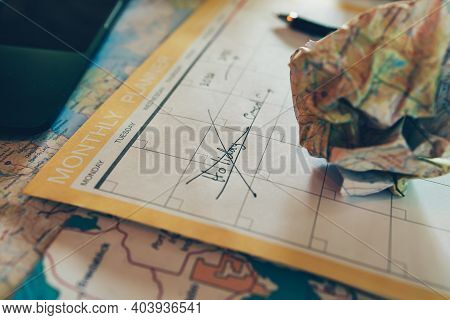 Tourist Planning Vacation With Calendar And Map. Cross Line In Holiday Text And Crump Paper Map . Ca