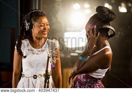 Arielle T And Selmor Mtukudzi Recording Vocal Part On Afro-pop Song In Studio