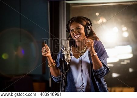 Waje Nigerian Singer Recording Vocal Part On Afro-pop Song In Studio
