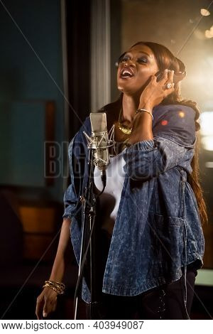 Waje Nigerian Singer Recording Vocal Part On Afro-pop Song In Studio