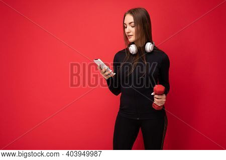 Photo Of Attractive Positive Young Brunette Woman Wearing Black Sport Clothes White Headphones Nad H