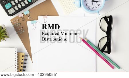 Paper With Required Minimum Distributions Rmd On A Table
