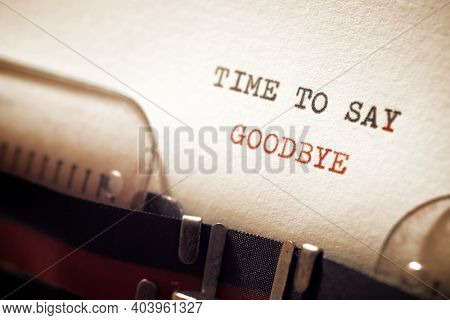 Time to say goodbye phrase written with a typewriter.