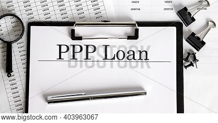 Paper With The Ppp Loan On The Table With Chart